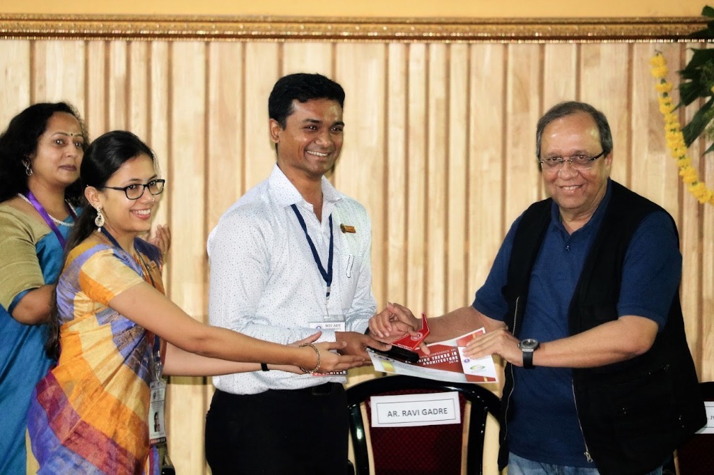 Ar. Nihar and Ar. Sayalee receiving Best Paper Award